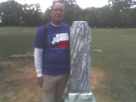 Here, Bob stands aside his namesakes' memorial at Scott's Chapel Cemetery